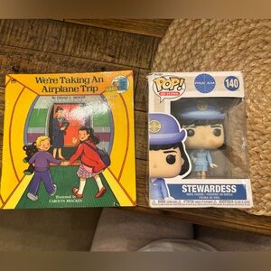 Stewardess Figure - Flight Attendant Taking an airplane book